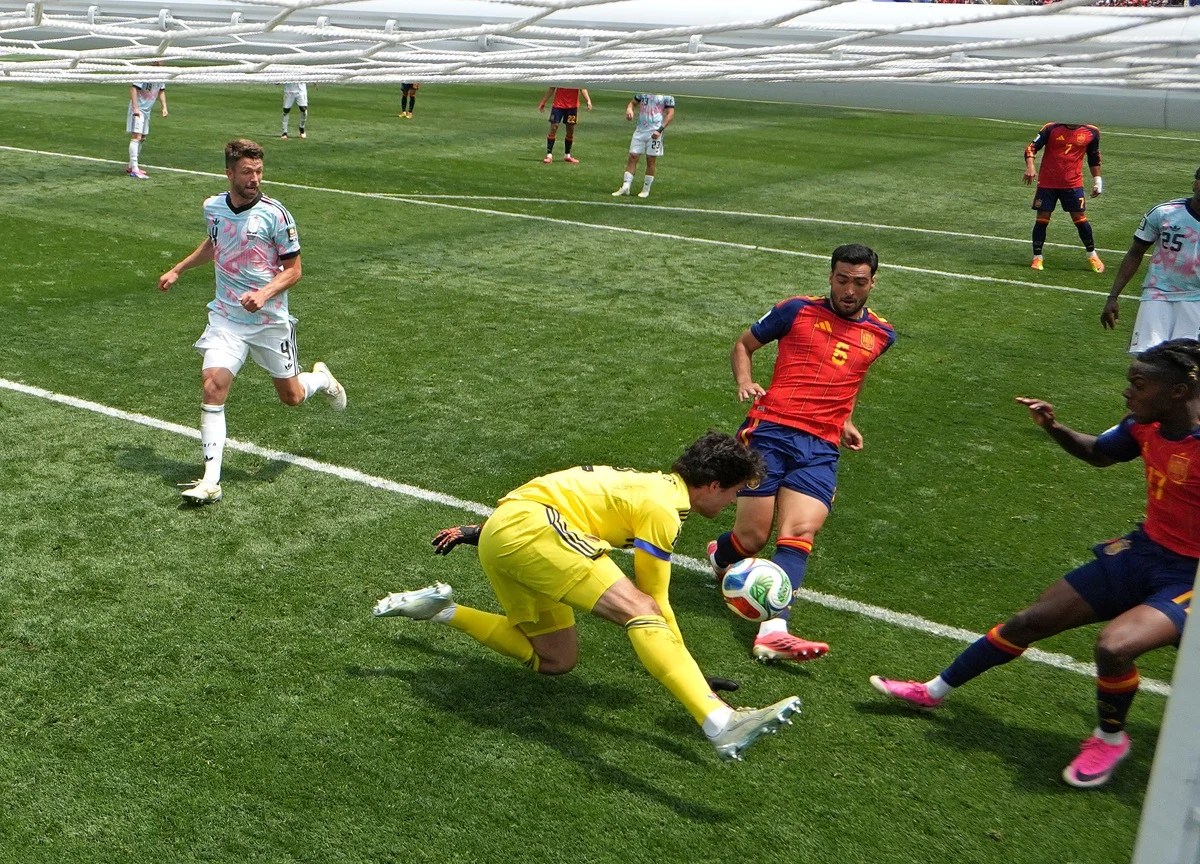 España estrechó las manos flojas de Bélgica y es semifinalista del Mundial 2026 con otro gol agónico de Merino